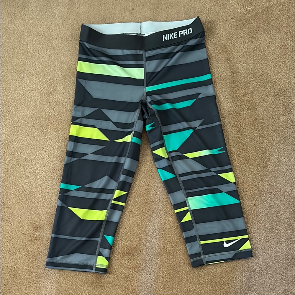4/$20 Nike Black and Green Leggings with Form-Fitting Design and Capri Length